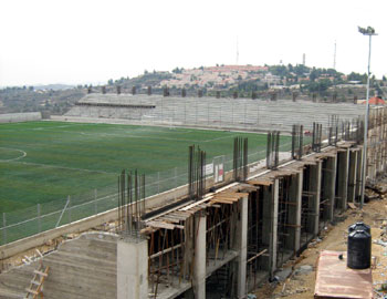 Al-Bira Stadium, with P'sagot settlement in the background. Photo: Iyad Hadad, B'Tselem, 16 November 2009.