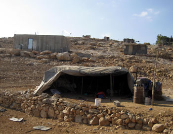 Houses designated for demolition in Umm al-Khir. Photo: Musa Abu Hashhash, B'Tselem, 19 November 2009.