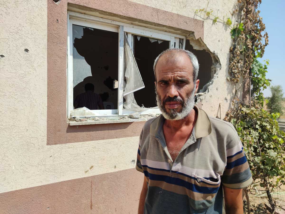 20220809_adnan_al_amur Adnan ‘Amur, Duniana's father, next to her bedroom window. Photo by Khaled al-'Azayzeh, B'Tselem, 9 August 2022