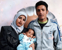 פיראס קסקס, אשתו מאג'ידה ואחת מבנותיהם. הצילום באדיבות המשפחה