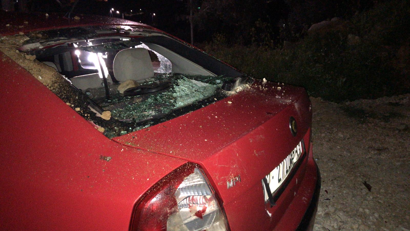A car window smashed by settlers under the Dmeidi family home, Huwarah, 2 Mar. 2021. Photo courtesy of the Dmeidi family
