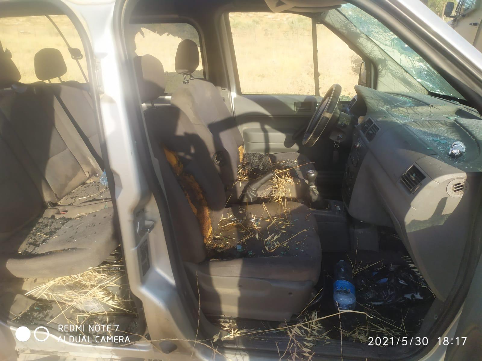 One of the cars vandalized by the settlers. Photo courtesy of the farmers 