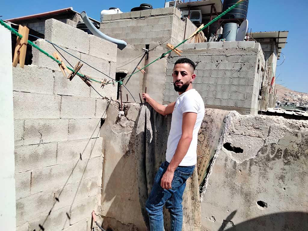 ‘Ali al-Hashash, at the spot from which he watched the clashes on the night of the incident. Photo by Salma a-Deb’i, B’Tselem, 24 Aug. 2021
