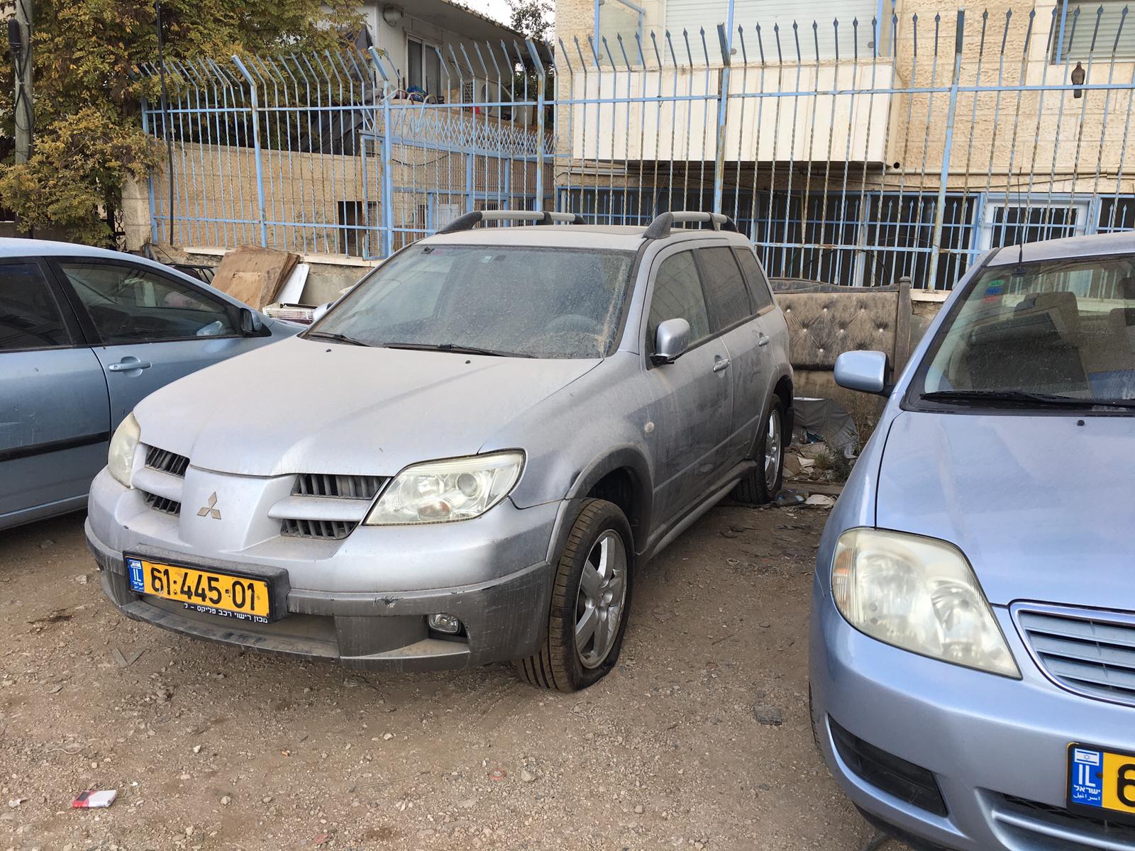 One of the cars whose tires were punctured.