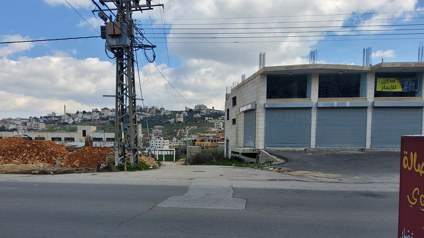 The road where the military vehicles stopped and from which Rayan was shot from behind. Ahead – the side street down which he ran and where he was shot to death. Photo by Salma a-Deb’i, B’Tselem, 16 Mar. 2022