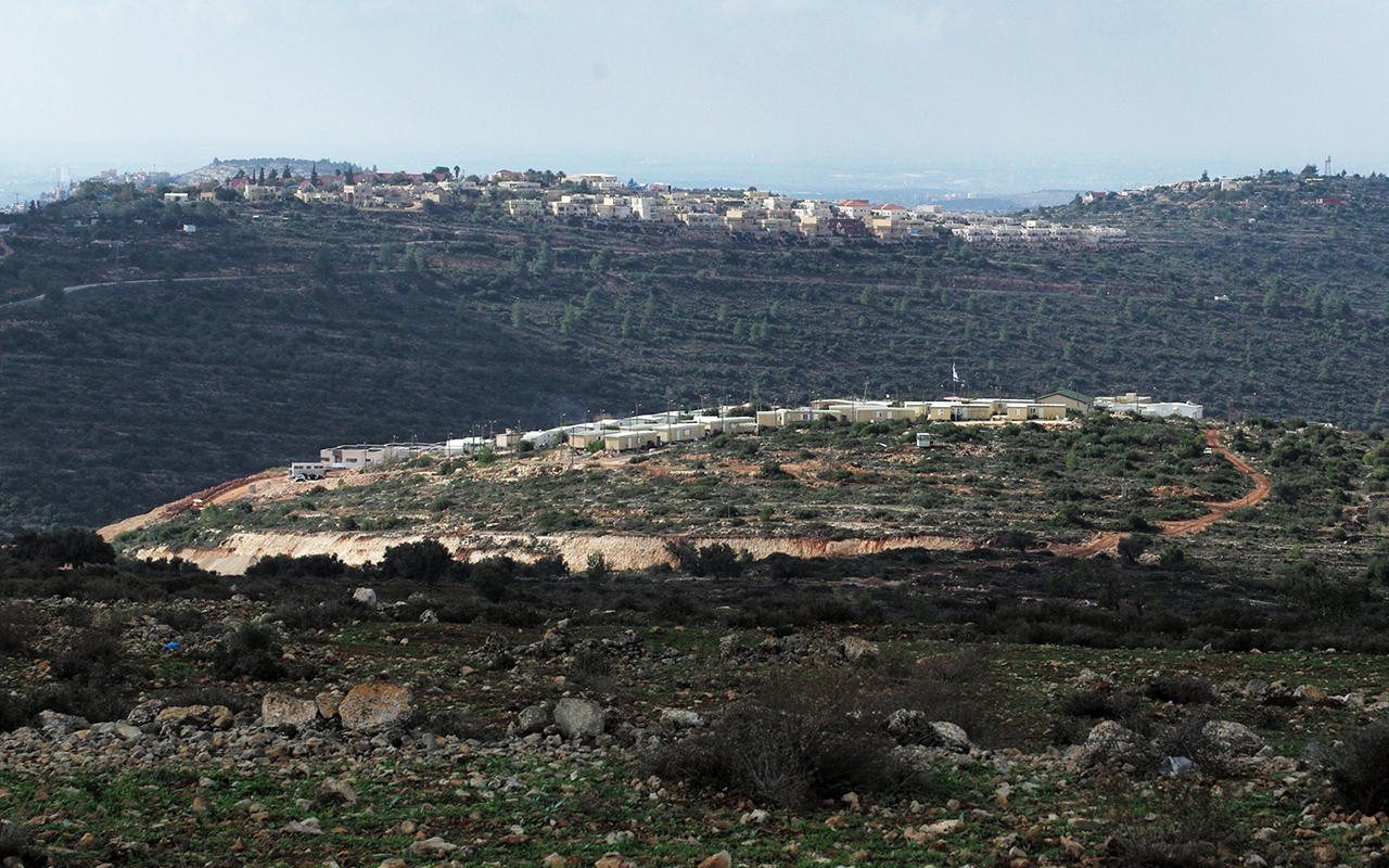 A view from Khirbet Na’alan to the settlement outpost of Kerem Re'im. Background: the Nerya settlement. Photo by Alex Levac