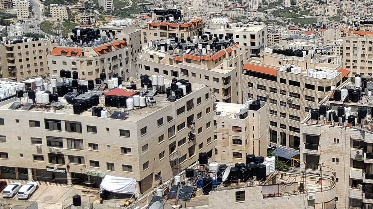 B’Tselem: Israel Deprives Palestinians of Water 4 Water tanks on the roofs of residential buildings in the city of Nablus. Photo by Salma a-Deb'i, B'Tselem, 19 April 2023