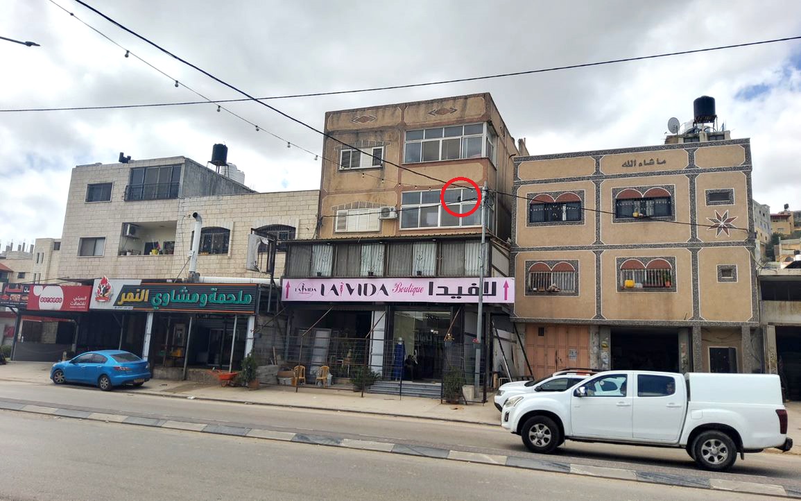 The window settlers shattered in the Mas’ud family home (circled in red). Photo: Salma a-Deb’i, B’Tselem, 28 March 2023 