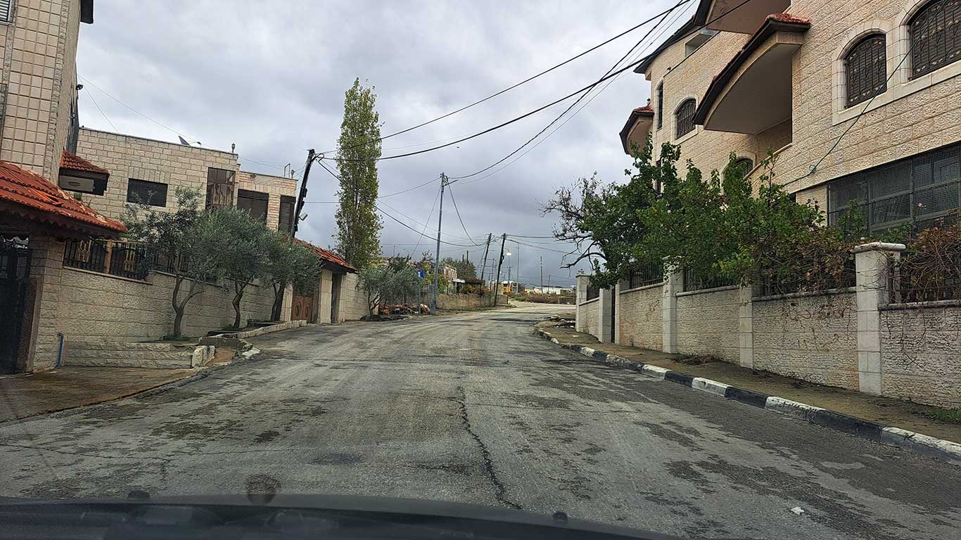 The place where Muhammad Saleh fell, at the edge of the Jabal a-Tawil neighborhood, after being shot by soldiers at the military post at the entrance to the settlement. Photo: Iyad Hadad, B’Tselem, 10 Dec. 2023 