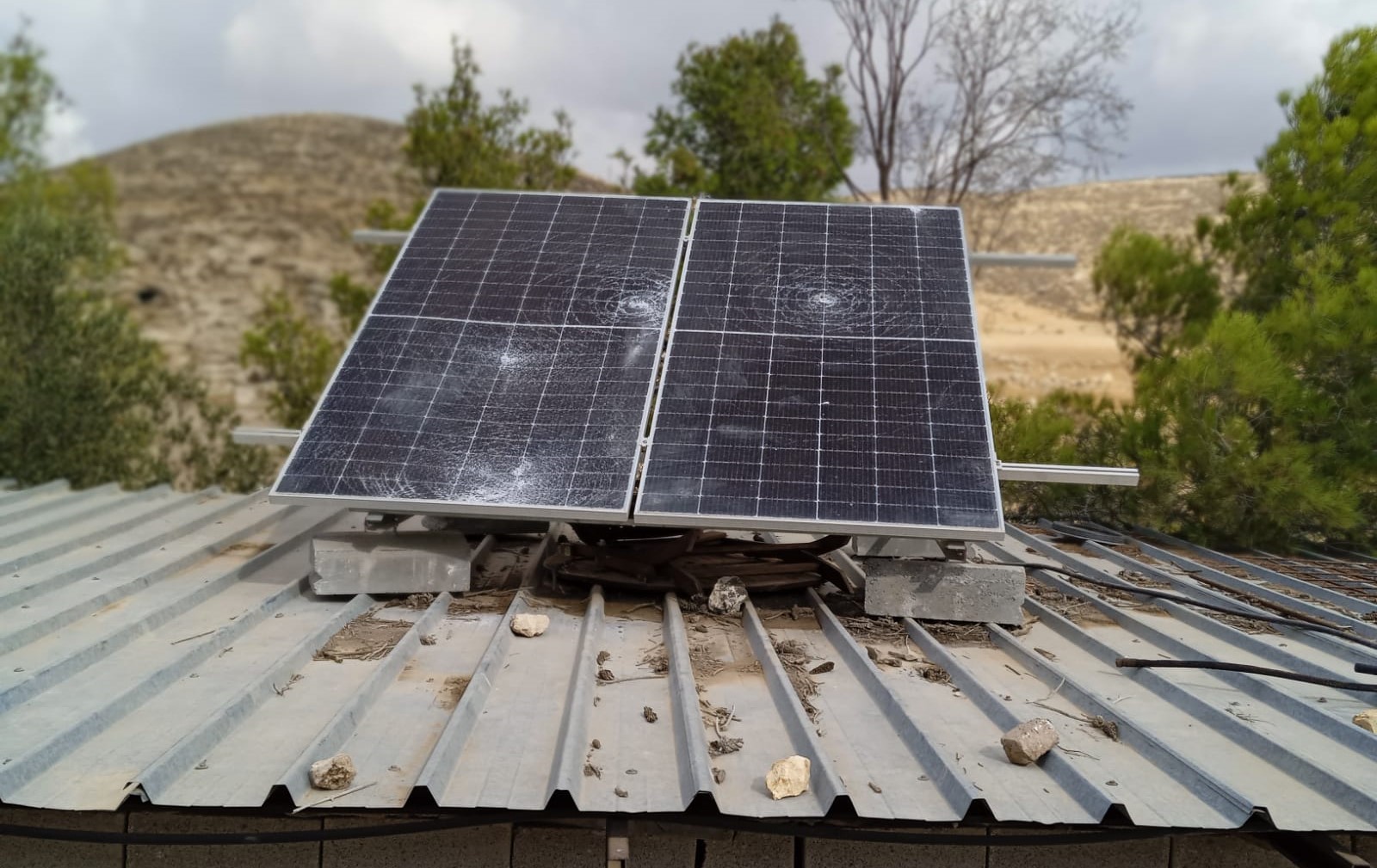 Solar panels vandalized by settlers in a home in Khirbet a-Radhem. Photo courtesy of community residents, 16 Oct. 2023 