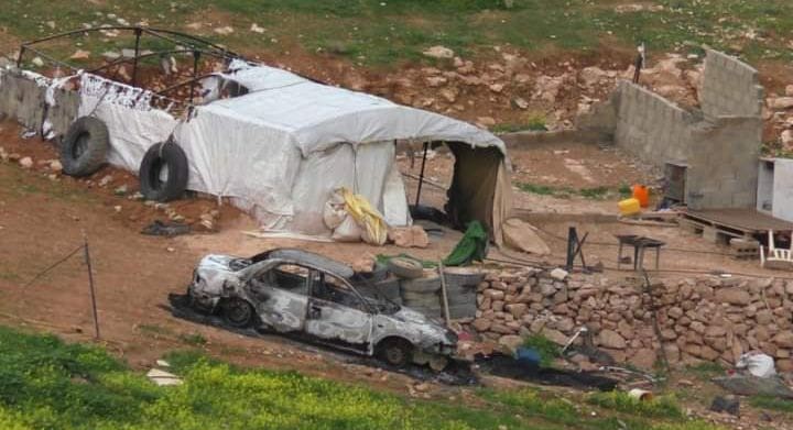 The family’s partially burnt tent and burnt car. Photo courtesy of the family   