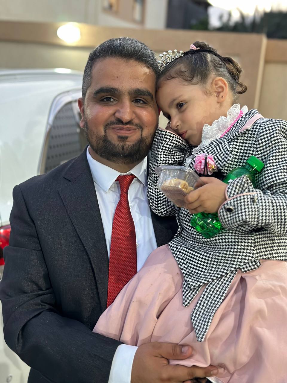 Dr. Khaled Hamudah and his daughter Razan before the war. Photo courtesy of the witness