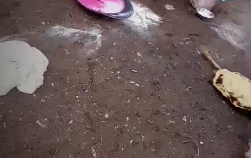 The dough, flour, and bread that the settlers threw on the ground. Still from video footage courtesy of residents