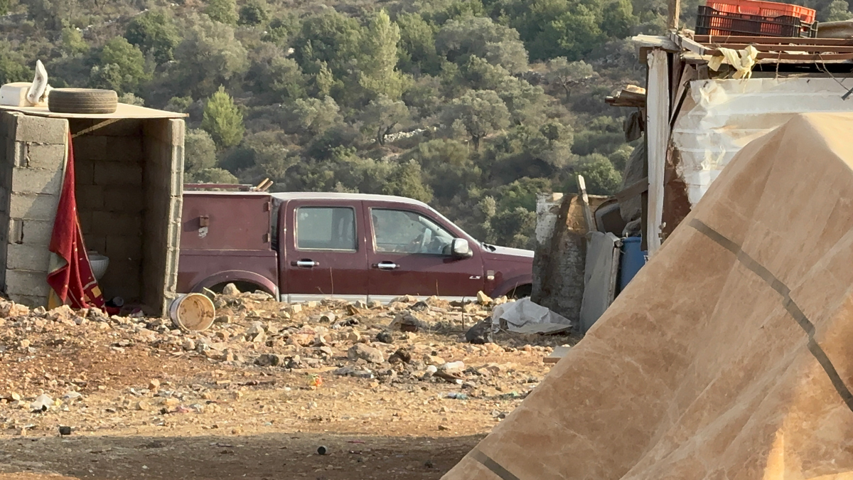A settlers’ vehicle near the community’s residential compound. Photo courtesy of local residents