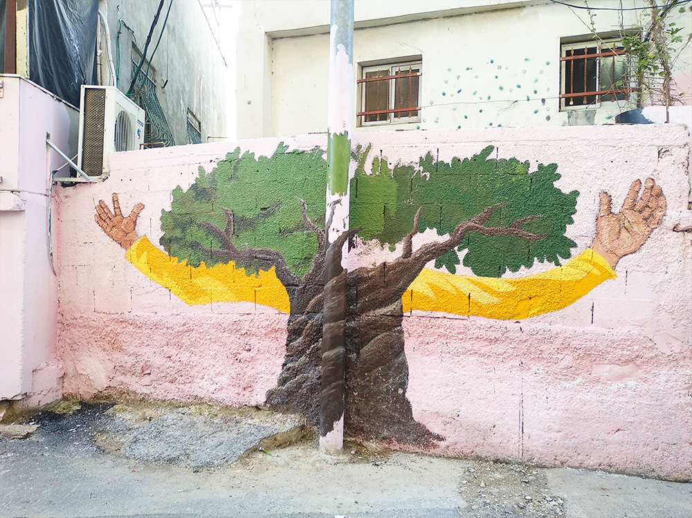 אחד מציורי הקיר בפרויקט אמנות הרחוב "אני עד לסילוואן"