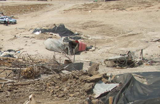 Huts demolished by the Civil Administration in al-Farsiya, in the Jordan Valley. Photo: Atef Abu a-Rub, B'Tselem, 19 July 2010.  