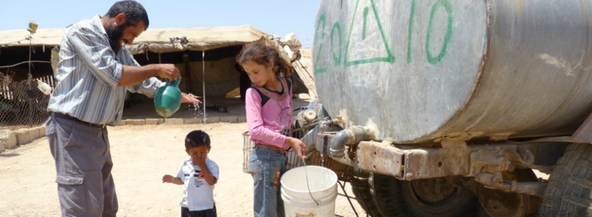 Village of a-Duqaiqah, South Hebron Hills, not hooked up to water grid; villagers purchase water from water-trucks, paying 4 times as much as the average water tariff for private use in Israel. Photo by Nasser Nawaj'ah, B’Tselem, 19 August 2012