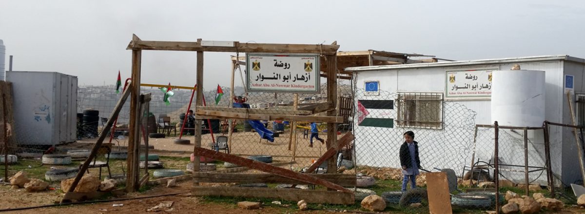 Children play in the school yard next to the classrooms that have not yet been demolished in Abu a-Nuwar's school. Photo: Sarit Michaeli, B'Tselem, 8 Feb. 2018