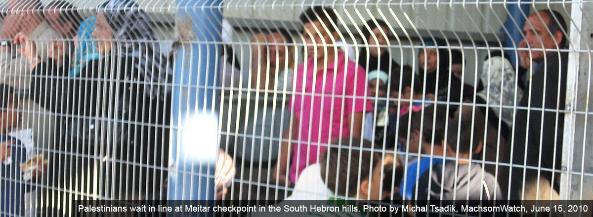 Palestinians wait in line at Meitar checkpoint in the South Hebron hills. Photo by Michal Tsadik, MachsomWatch,15 June 15, 2010