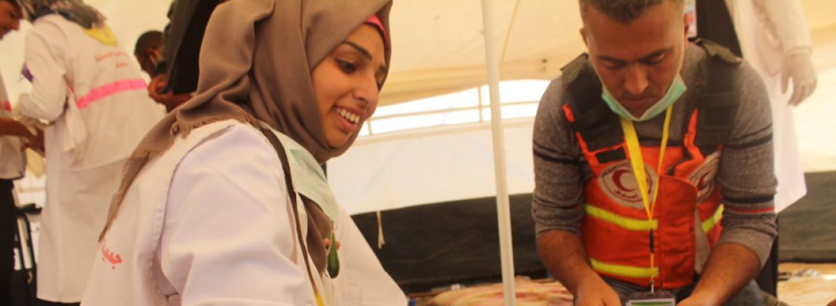 Rosan a-Najar in the medical tent at the Return Marches. Photo by Abd al-Aziz a-Najar