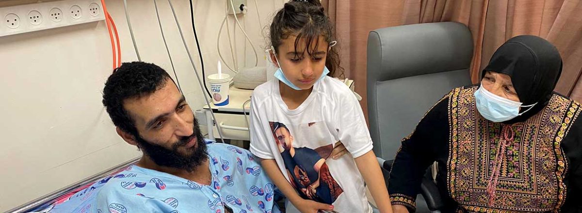 Kayed Fasfous with his daughter and his mother in hospital. Photo courtesy of family