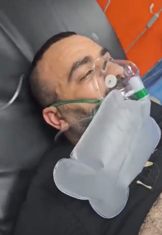 Muhammad Jaber being taken to hospital. Still from video footage courtesy of residents     