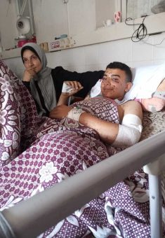 Suhad al-Jamali with her son Muhammad at a hospital in the Gaza Strip. Photo courtesy of the family