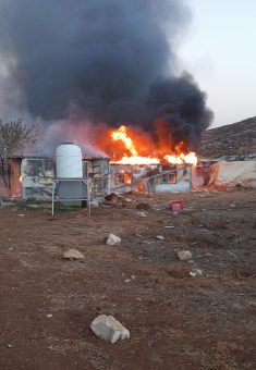 A home set on fire by the settlers. Photo courtesy of residents