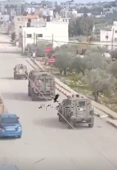 Military jeeps entering the village. Used under section 27a 