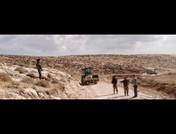 Military digger carrying rocks to block a road in Masafer Yatta., 19 Nov. 2017. Photo by Nidal Yunes, head of the Masafer Yatta Council and resident of Khirbet Jenbah.