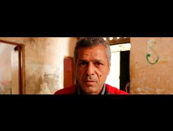 Husam Balur, who worked in Israel for 16 years, at his home in the a-Nueseirat Refugee Camp in the Gaza Strip. Photo: Khaled al-'Azayzeh, B'Tselem, April 28,