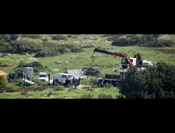 The confiscation this morning in Khirbet Ibziq.  Photo by 'Aref Daraghmeh, B'Tselem, 26 March 2020