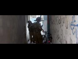  Israeli soldiers during a raid on al-‘Arrub R.C., Hebron District. Photo by Anne Paq, Activestills, 24 May 2013