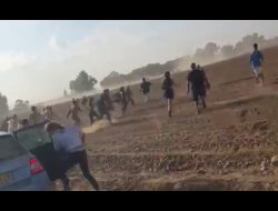 Israeli civilians fleeing armed Palestinians near Re'im, an Israeli community near the Gaza border. Still photo from a video posted on social media. Photo used under Sec. 27a of the Copyright Law