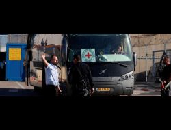 Red Cross bus waiting outside Ofer military prison for Palestinian prisoners released as part of a deal between Israel and Hamas. Photo by Ammar Awad, Reuters, 24 November, 2023