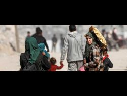 Palestinians fleeing following new evacuation orders in the Gaza Strip. Photo by Reuters, 18 March 2025