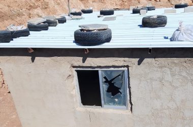 A window smashed by settlers in the family’s home. Photo courtesy of the family 