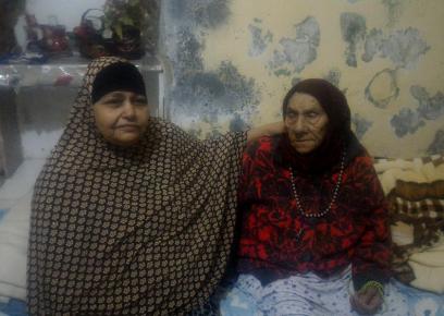 <br />
Safiya (100) and 'Aisha' (58) Awad in their apartment where soldiers entered in the dead of night. Photo: Iyad Hadad, B'Tselem, 19 December 17<br />
