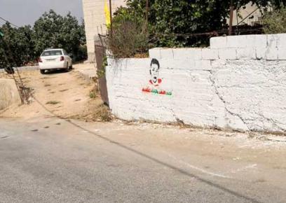 "جرافيتي" على جدار في الموقع الذي أصيب فيه محمد تميمي جرّاء رصاص الجنود. تصوير إياد حدّاد، بتسيلم، 25.7.21