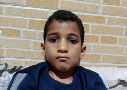 Bilal al-Masharawi in his bed. Photo: Olfat al-Kurd, B’Tselem, 14 March 2023