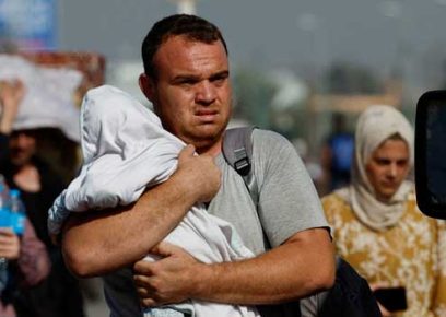 Palestinians fleeing north Gaza walk towards the south. Photo by Mohammed Salem, Reuters, 9 November, 2023