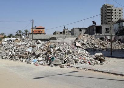 חורבות בניין א-דאלי בח'אן-יונס. צילום: מוחמד סינוואר, בצלם, 30.7.14