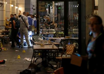 Site of shooting attack at Sarona. Photo by Ammar Awad, Reuters.