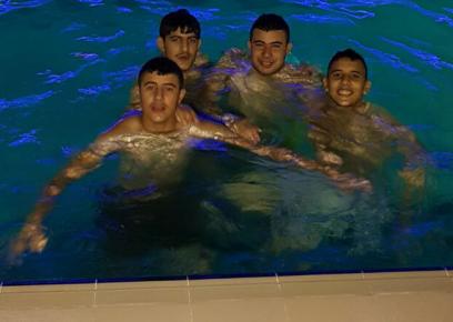 The boys at the swimming pool shortly before to the incident. First on the right: Mahmoud Badran.