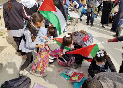 Khirbat Zanutah school girls at the location of the ruined school building. Photo by Nasser Nawaj'ah, B'Tselem, 10 April 2018