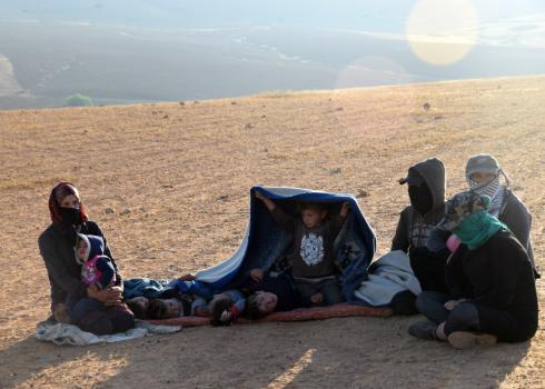Several members of the extended al Abu al-Kabash family in the field they removed to early in the morning. Photo by ‘Aref Daraghmeh, B’Tselem, 24 April 2018 Several members of the extended al Abu al-Kabash family in the field they removed to early in the morning. Photo by ‘Aref Daraghmeh, B’Tselem, 24 April 2018