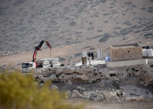 Loading sections of the pre-fab onto the CA truck. Photo by 'Aref Daraghmeh, B'Tselem, 23 October 2018