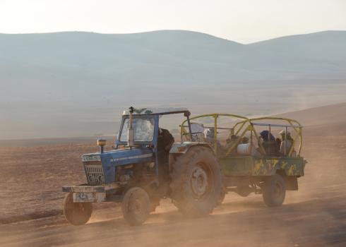 A family evacuating their home in Khirbet Humsah last June. Photo by ‘Aref Daraghmeh, B'Tselem