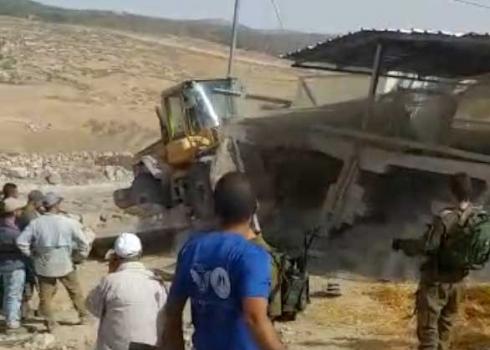 Photo caption: Demolition of livestock pen in Khirbet Ghuwein al-Fauqa. Photo by local resident.