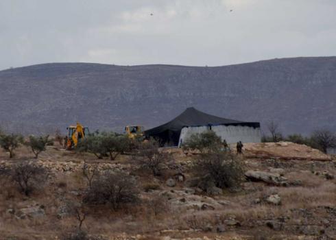 Demolition of water cisterns in Khirbet ‘Einun. Photo by ‘Aref Daraghmeh, B’Tselem, 3 Dec. 2019